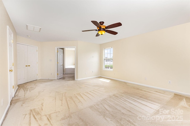 13305 Mallard Landing Rd, Charlotte, NC 28278 - unfurnished bedroom with light colored carpet, baseboards, and connected bathroom