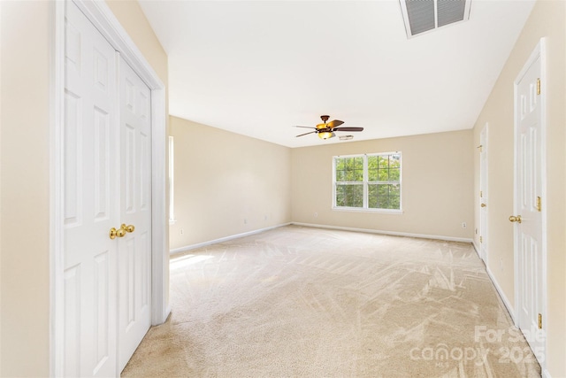 13305 Mallard Landing Rd, Charlotte, NC 28278 - unfurnished bedroom featuring light carpet, baseboards, ceiling fan, and a closet