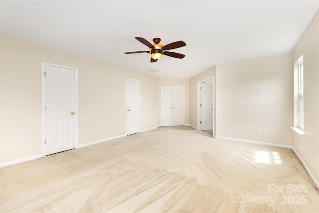 13305 Mallard Landing Rd, Charlotte, NC 28278 - empty room featuring light colored carpet, a ceiling fan, and baseboards