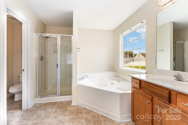 13305 Mallard Landing Rd, Charlotte, NC 28278 - bathroom featuring vanity, a shower stall, a bath, toilet, and tile patterned flooring