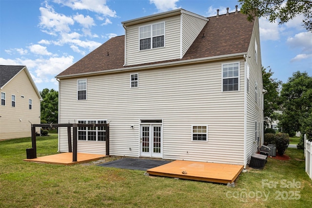 13305 Mallard Landing Rd, Charlotte, NC 28278 - rear view of house with a wooden deck, a patio area, a lawn, and roof with shingles