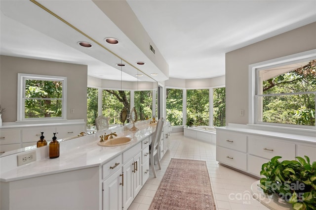 310 Southwood Ln, Columbus, NC 28722 - full bath with vanity, tile patterned floors, a garden tub, and recessed lighting