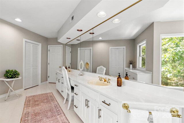 310 Southwood Ln, Columbus, NC 28722 - full bathroom with a closet, double vanity, recessed lighting, and tile patterned flooring