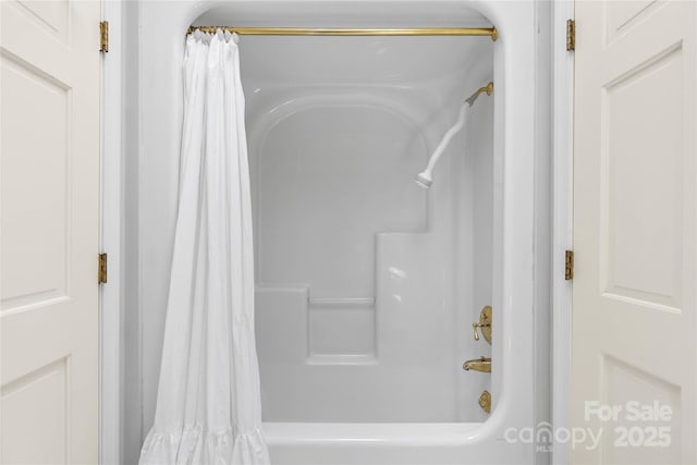 310 Southwood Ln, Columbus, NC 28722 - full bathroom featuring shower / bath combo with shower curtain