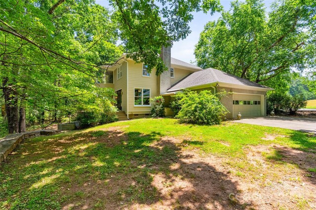 310 Southwood Ln, Columbus, NC 28722 - view of front of house featuring an attached garage, driveway, and crawl space