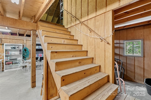 310 Southwood Ln, Columbus, NC 28722 - stairway with wood walls and concrete flooring