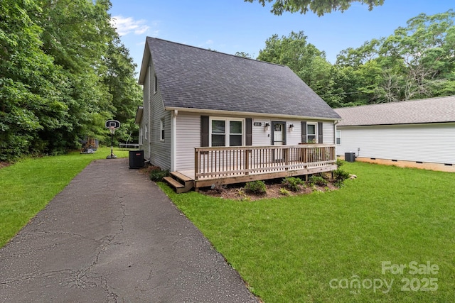 2146 Marwood Ln, Albemarle, NC 28001 - cape cod home featuring central AC unit, roof with shingles, a wooden deck, and a front yard
