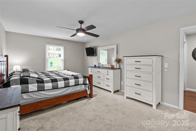 2146 Marwood Ln, Albemarle, NC 28001 - bedroom featuring multiple windows, light carpet, baseboards, and ceiling fan