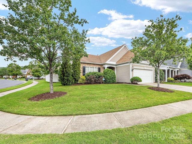 8603 Robinson Meadow Ct, Charlotte, NC 28277 - view of front of house featuring driveway, a garage, a front yard, and a shingled roof