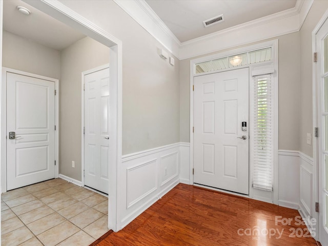 8603 Robinson Meadow Ct, Charlotte, NC 28277 - entryway with crown molding and wainscoting