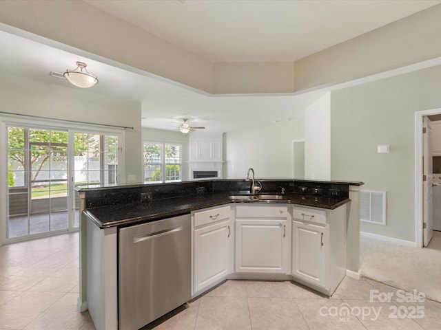 8603 Robinson Meadow Ct, Charlotte, NC 28277 - kitchen featuring dishwasher, a fireplace, light tile patterned floors, and ceiling fan