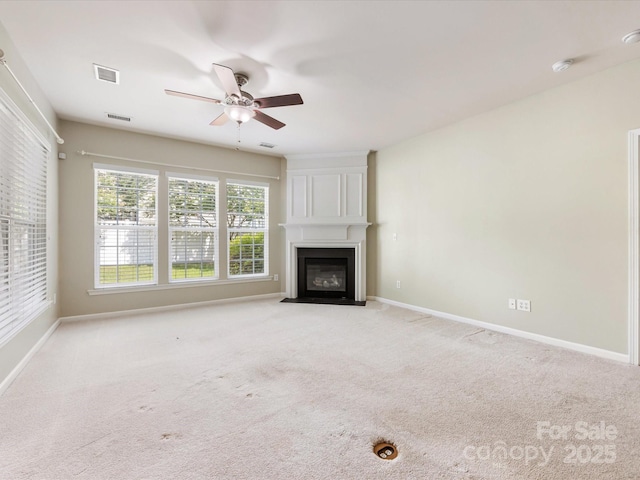 8603 Robinson Meadow Ct, Charlotte, NC 28277 - unfurnished living room with a ceiling fan, a large fireplace, and carpet flooring