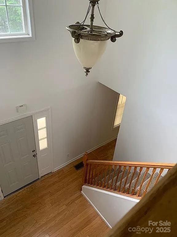 907 Gleason St, Arden, NC 28704 - stairway with wood finished floors and a towering ceiling
