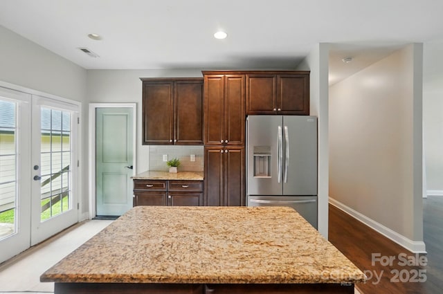 6618 Alexander Rd, Charlotte, NC 28270 - kitchen with stainless steel refrigerator with ice dispenser, french doors, plenty of natural light, baseboards, and recessed lighting