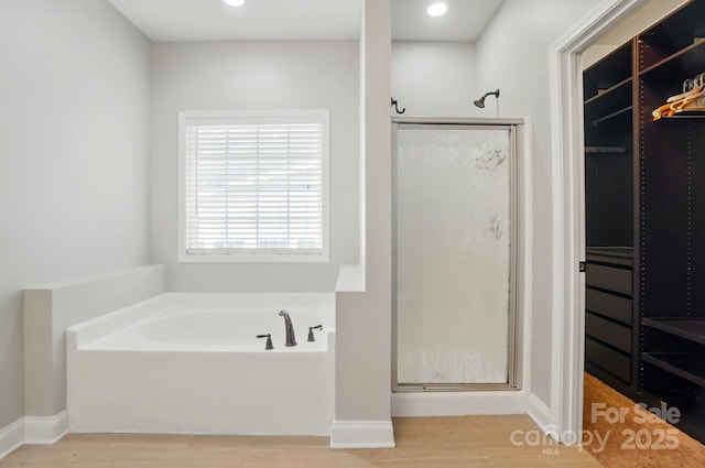 6618 Alexander Rd, Charlotte, NC 28270 - bathroom with a shower stall, a bath, wood finished floors, baseboards, and recessed lighting