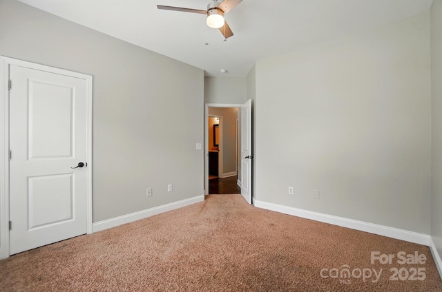 6618 Alexander Rd, Charlotte, NC 28270 - unfurnished bedroom with carpet floors, baseboards, and a ceiling fan