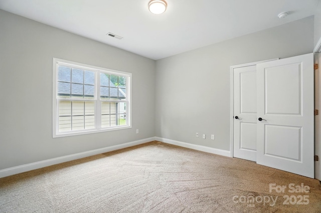 6618 Alexander Rd, Charlotte, NC 28270 - unfurnished bedroom featuring baseboards and carpet floors