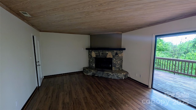 105 Toxaway Views Dr Unit 402, Lake Toxaway, NC 28747 - unfurnished living room featuring wooden ceiling, wood finished floors, a stone fireplace, and baseboards