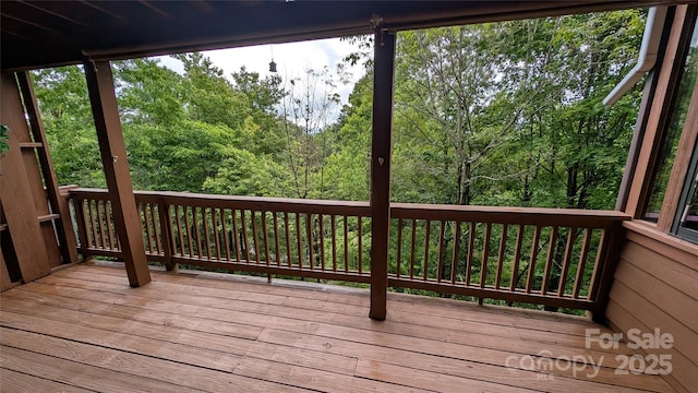 105 Toxaway Views Dr Unit 402, Lake Toxaway, NC 28747 - wooden deck with a wooded view
