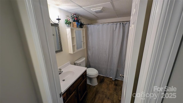 105 Toxaway Views Dr Unit 402, Lake Toxaway, NC 28747 - bathroom with a drop ceiling, toilet, vanity, wood finished floors, and curtained shower