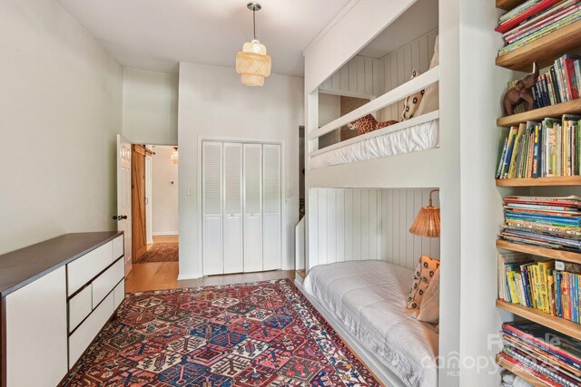 5 Lowry Ln, Weaverville, NC 28787 - bedroom featuring wood finished floors and a closet