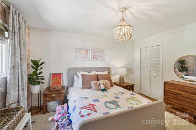 5 Lowry Ln, Weaverville, NC 28787 - bedroom featuring a chandelier and a closet