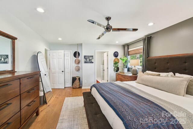 5 Lowry Ln, Weaverville, NC 28787 - bedroom with light wood-style flooring, recessed lighting, ensuite bathroom, and a ceiling fan