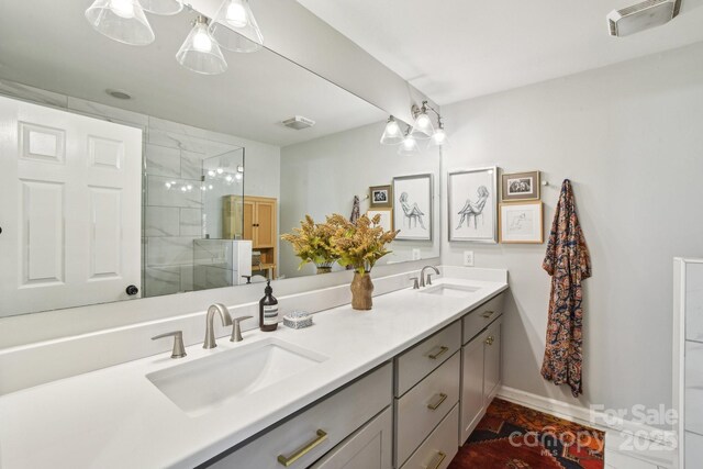 5 Lowry Ln, Weaverville, NC 28787 - full bathroom featuring double vanity, a stall shower, and baseboards