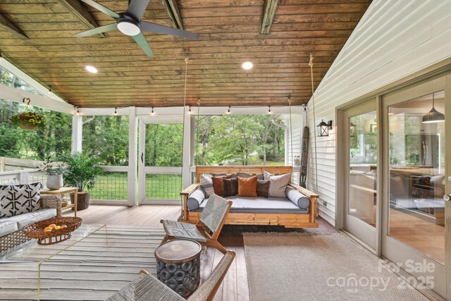 5 Lowry Ln, Weaverville, NC 28787 - sunroom / solarium with lofted ceiling, ceiling fan, and an outdoor hangout area