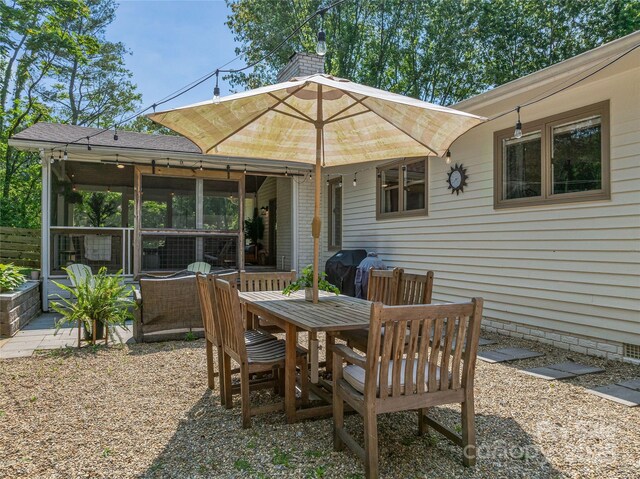 5 Lowry Ln, Weaverville, NC 28787 - view of patio featuring grilling area, outdoor dining area, and a sunroom