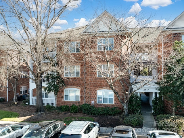 5617 Fairview Rd Unit 9, Charlotte, NC 28209 - view of property with uncovered parking