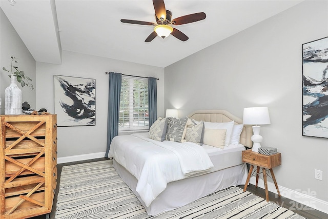 300 W 5th St Unit 003, Charlotte, NC 28202 - bedroom featuring baseboards and a ceiling fan