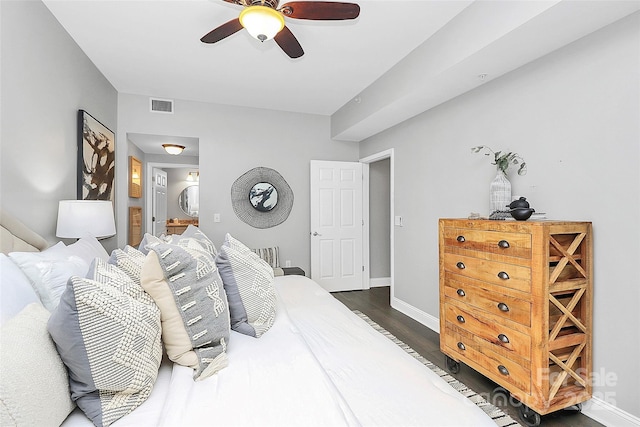 300 W 5th St Unit 003, Charlotte, NC 28202 - bedroom featuring dark wood-type flooring and ceiling fan