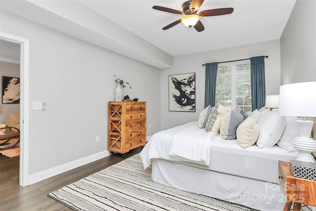 300 W 5th St Unit 003, Charlotte, NC 28202 - bedroom with wood finished floors and ceiling fan