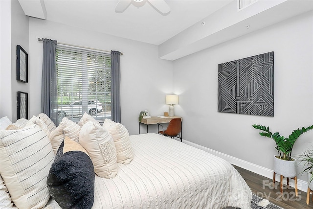 300 W 5th St Unit 003, Charlotte, NC 28202 - bedroom with wood finished floors and ceiling fan