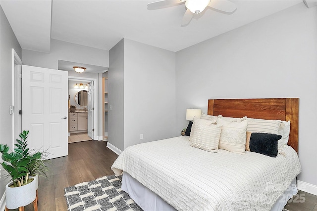 300 W 5th St Unit 003, Charlotte, NC 28202 - bedroom with wood finished floors, a ceiling fan, and ensuite bath