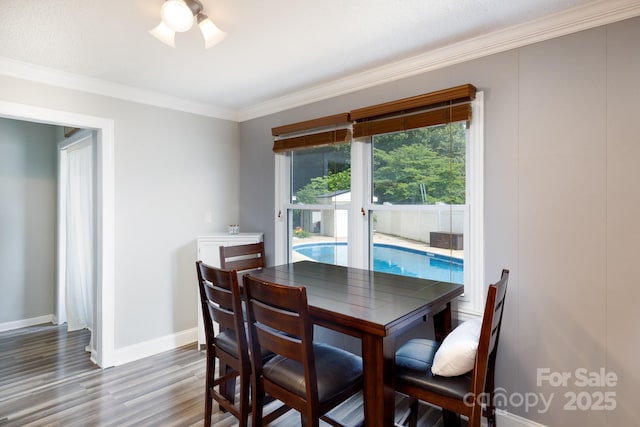 1197 Fincher Rd, Fort Lawn, SC 29714 - dining room featuring wood finished floors, ornamental molding, and baseboards