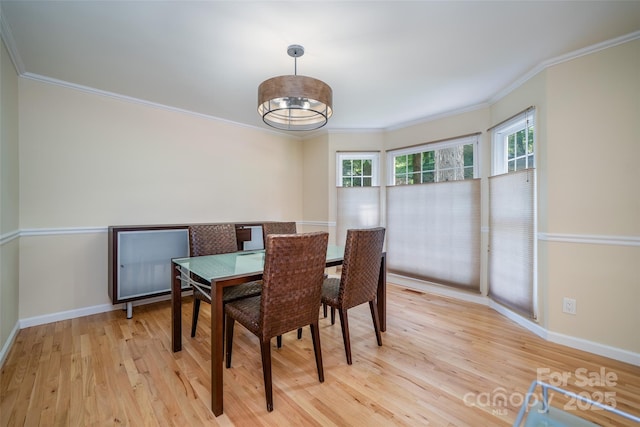 114 Coachmans Trl, Asheville, NC 28803 - dining room featuring crown molding and light wood-style floors
