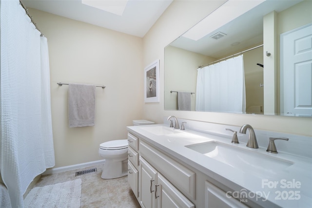 114 Coachmans Trl, Asheville, NC 28803 - full bath with double vanity, a skylight, a shower with curtain, and tile patterned floors