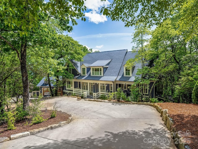 251 Toxaway Ct, Lake Toxaway, NC 28747 - shingle-style home featuring driveway and covered porch