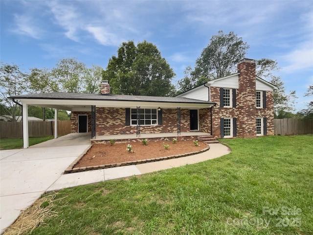 1224 Bethlehem Rd, Kings Mountain, NC 28086 - tri-level home with a chimney, concrete driveway, brick siding, a carport, and a porch
