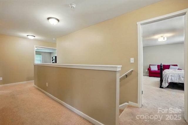 3106 Crosswind Dr, Fort Mill, SC 29707 - hallway featuring an upstairs landing, carpet, and baseboards