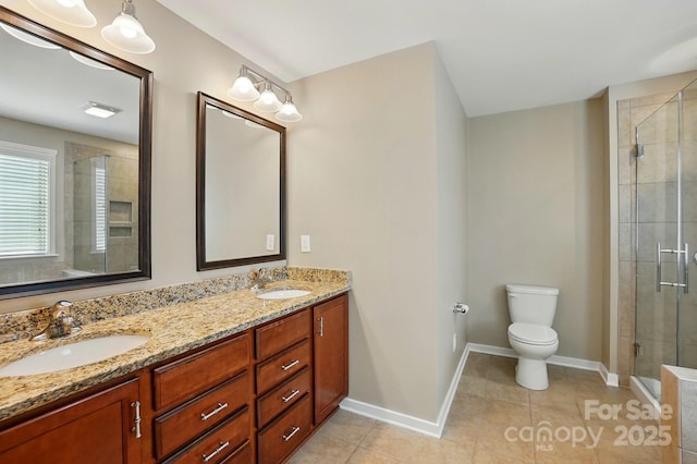 3106 Crosswind Dr, Fort Mill, SC 29707 - bathroom with double vanity, a shower stall, toilet, and tile patterned flooring