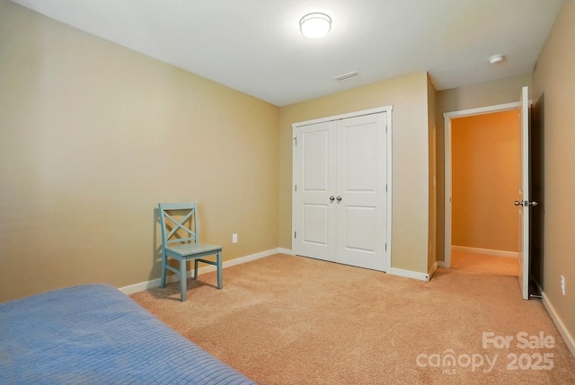 3106 Crosswind Dr, Fort Mill, SC 29707 - bedroom featuring light carpet, baseboards, and a closet
