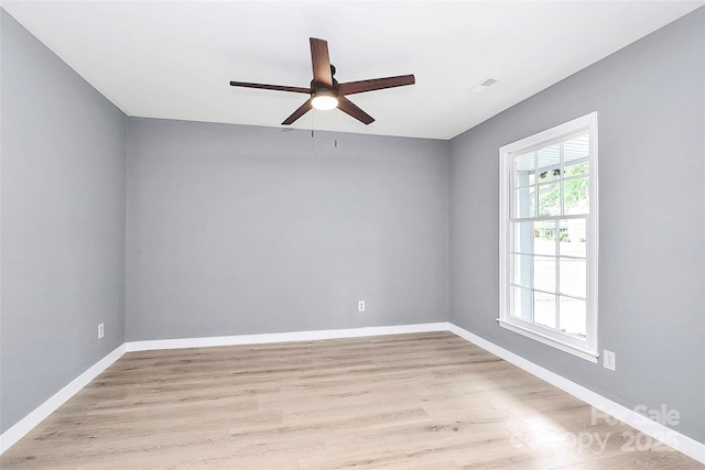 7118 April Ridge Ln, Charlotte, NC 28215 - unfurnished room featuring ceiling fan, light wood finished floors, and baseboards