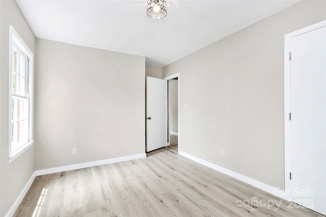 7118 April Ridge Ln, Charlotte, NC 28215 - unfurnished room featuring light wood finished floors and baseboards