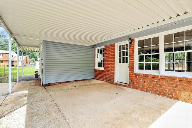 7118 April Ridge Ln, Charlotte, NC 28215 - view of patio / terrace featuring a carport