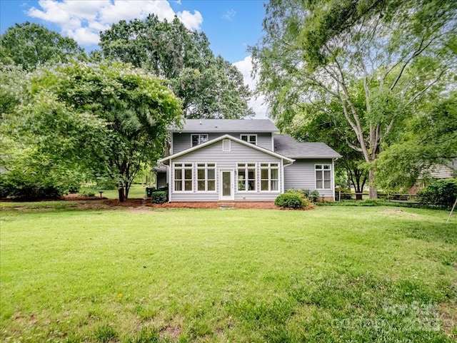 3327 Archdale Dr, Charlotte, NC 28210 - back of property with a yard and roof with shingles