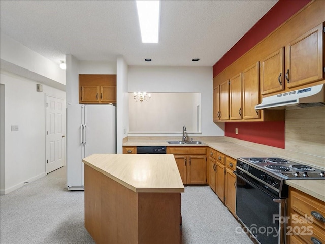3327 Archdale Dr, Charlotte, NC 28210 - kitchen with electric range oven, under cabinet range hood, freestanding refrigerator, a sink, and light countertops