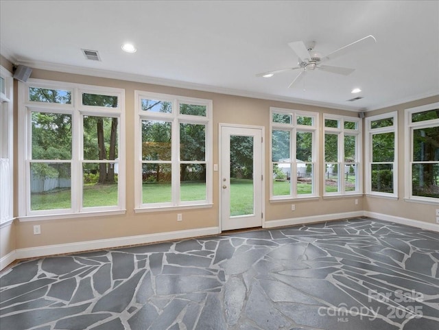 3327 Archdale Dr, Charlotte, NC 28210 - unfurnished sunroom with stone flooring, baseboards, ornamental molding, healthy amount of natural light, and recessed lighting